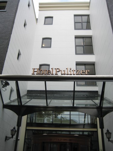 Exterior front entrance of Hotel Pulitzer, Amsterdam, Holland, 25 canal houses, Travel Writer Nancy D. Brown