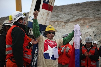 Chile_Mine_Rescue_-_Mario_Gomez A guest at the San Jose copper-gold mine raises his arms in triumph after completing an extended checking-out process.